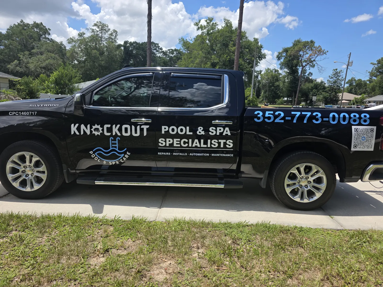 Knockout Pool & Spa Care service truck lettered Pool & Spa Specialists